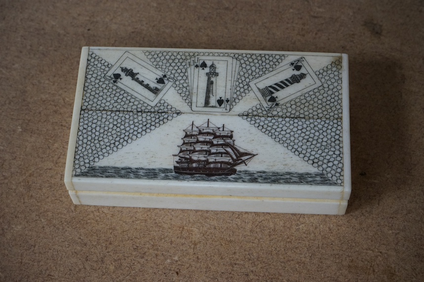 A scrimshaw carved bone miniature playing card set, 10.5cm wide. Condition - fair/good